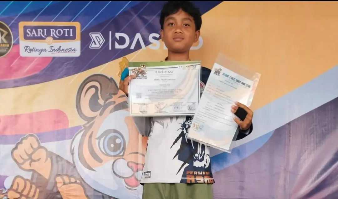Atlet SMPN 3 Ciparay, Krisna Fajar Gemilang Raih Emas di Kejuaraan Pencak Silat Nasional