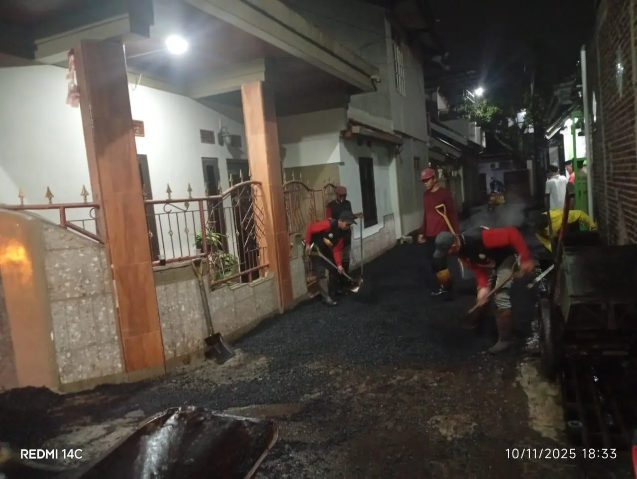 Tingkatkan Infrastruktur, Desa Sukamukti Realisasikan Jalan Hotmix di RW 14 Kampung Pelangi